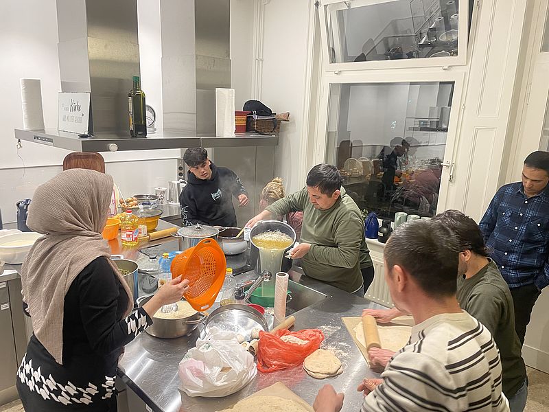 Teilnehmer des Kochens