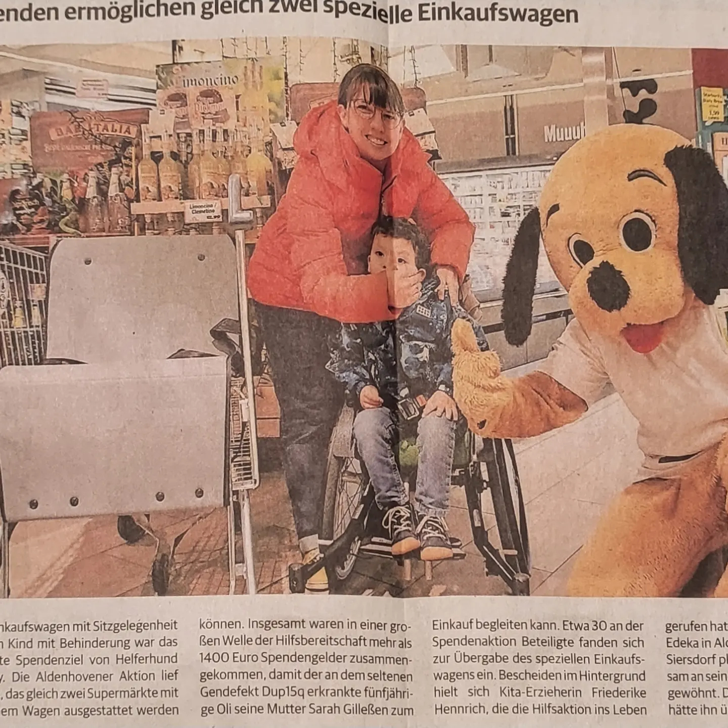 Buddy mit Einkaufswagen und Kind